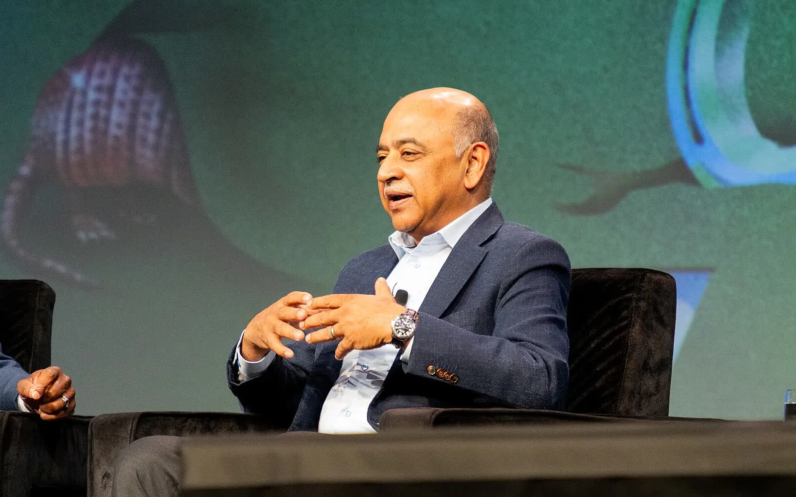 Arvind Krishna, IBM CEO, speaking on a stage at SXSW 2025