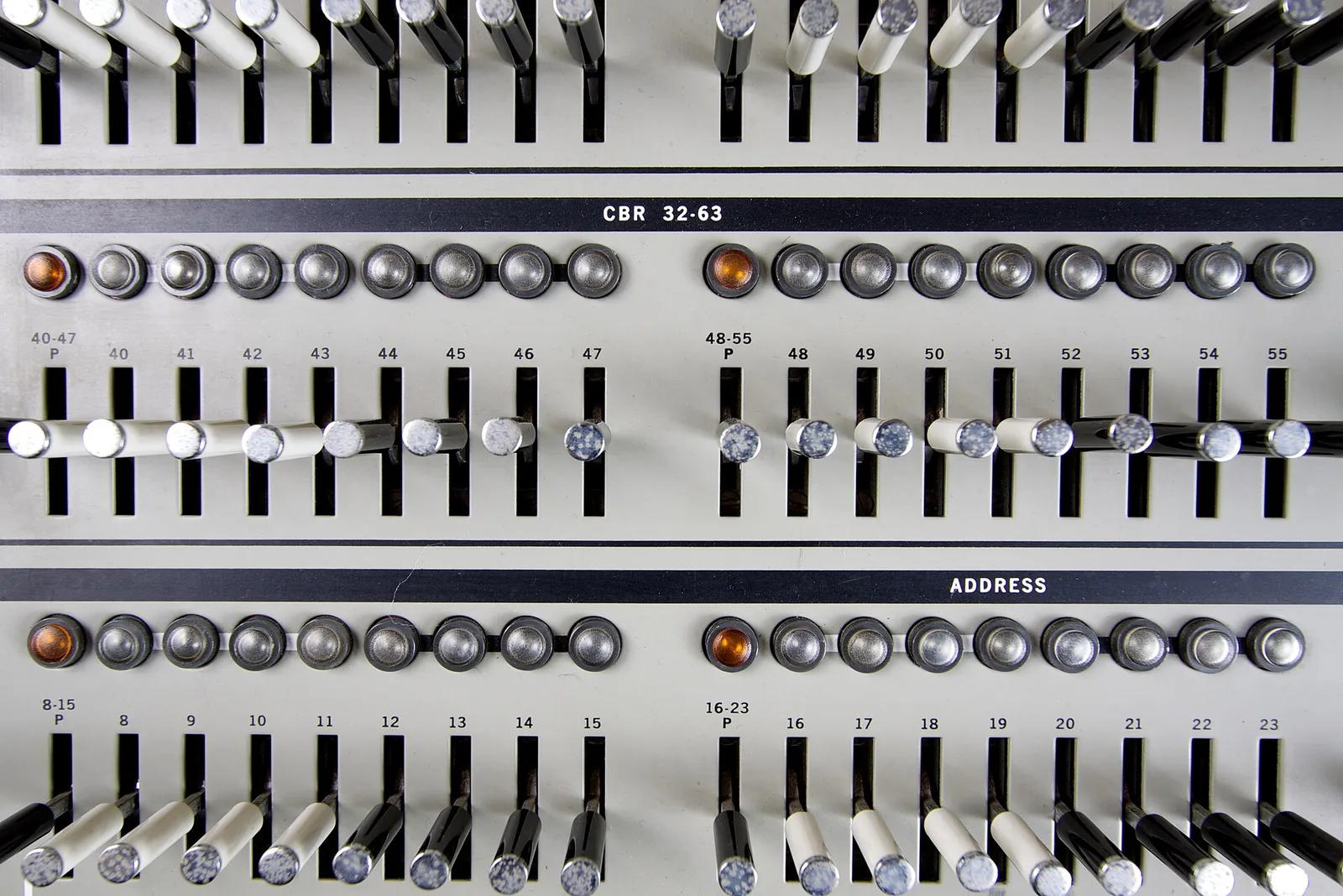 Control panel of an IBM System/360, with rows of switches and lights